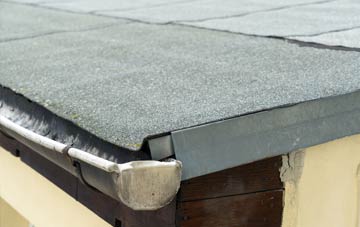 repair or replace Dinas Dinlle flat roofing?